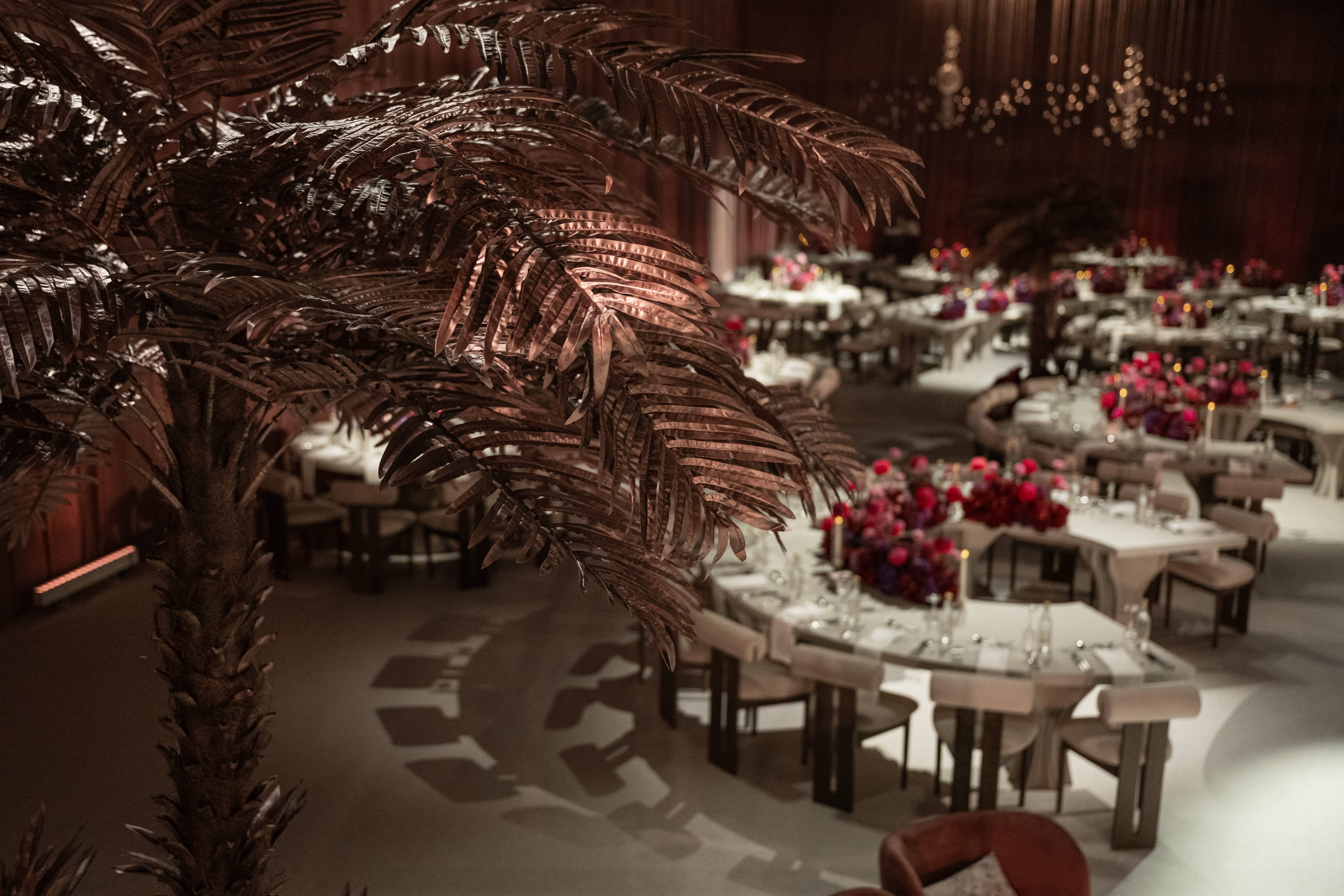 Grand reception hall with suspended floral installation